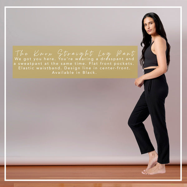 A dark-haired woman wears a black ribbed tank top with the Knox Straight Leg Pant cut from bamboo cotton fleece.