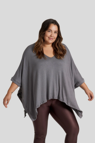 Woman posing in The Grace Poncho 