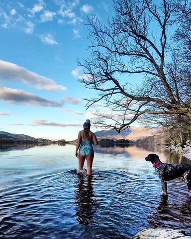 Abby walking into a lake