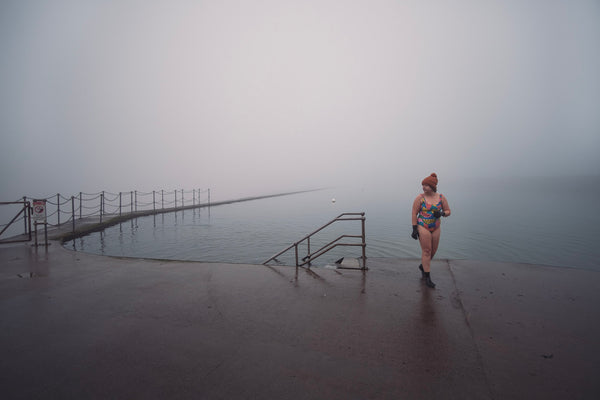 Lauren on a lido with misty water behind her