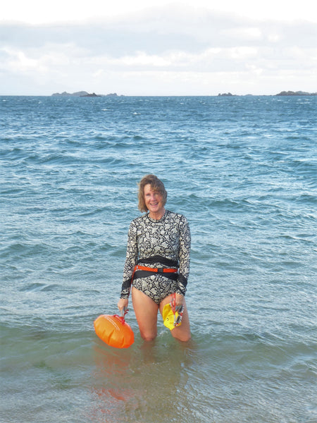 Anna standing out in the sea at knee height