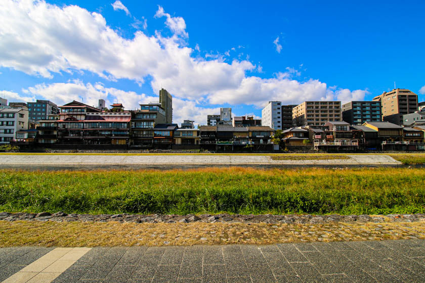 The cycling path and view along the Kamo river, Kyoto.