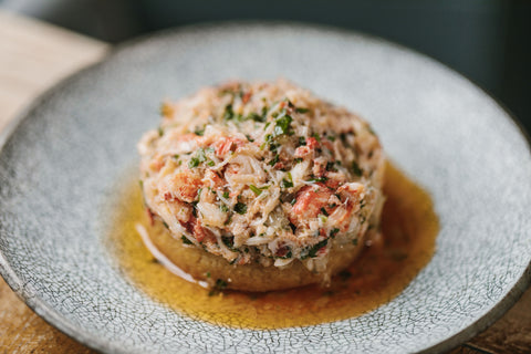 crumpet topped with lobster and brown butter