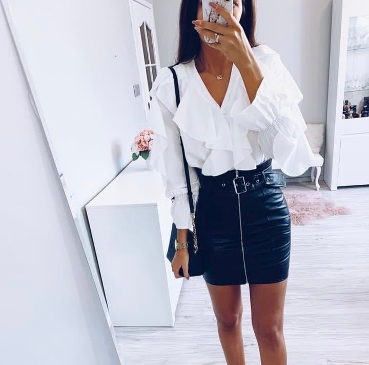 white shirt leather skirt