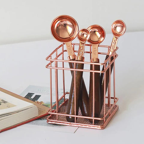 copper measuring cups and spoons