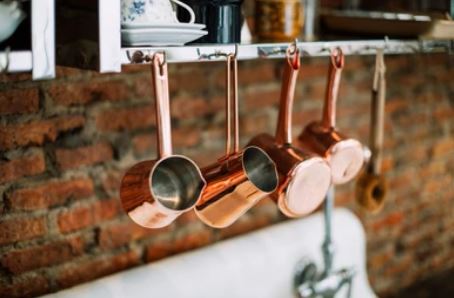 copper measuring cups and spoons