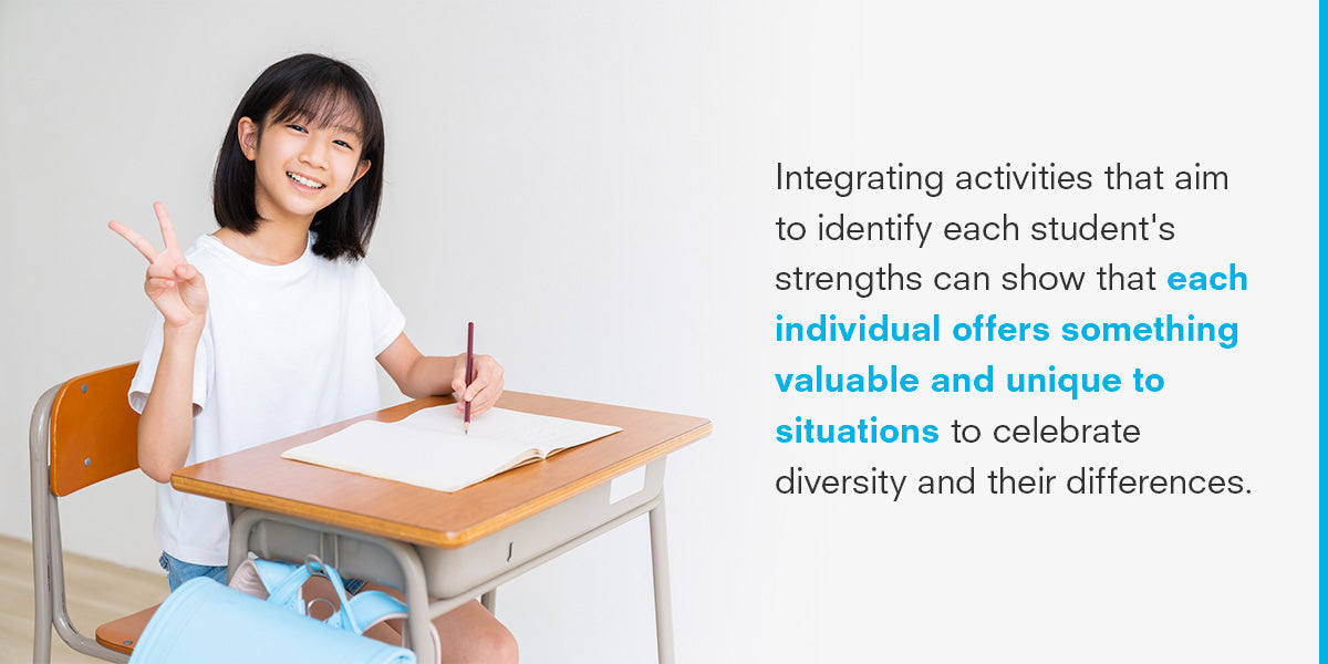 asian girl sitting at desk smiling