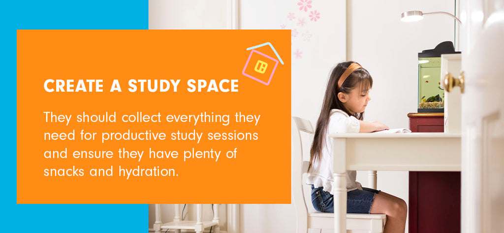 A young girl sits at a desk in her study space