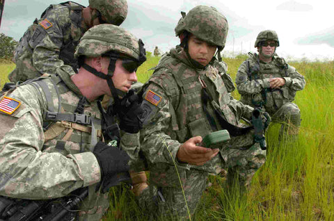 Platoon Leader Looking at Grid With Soldiers