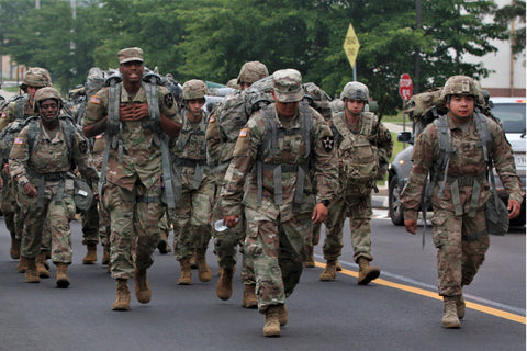 soldiers in a unit ruck march