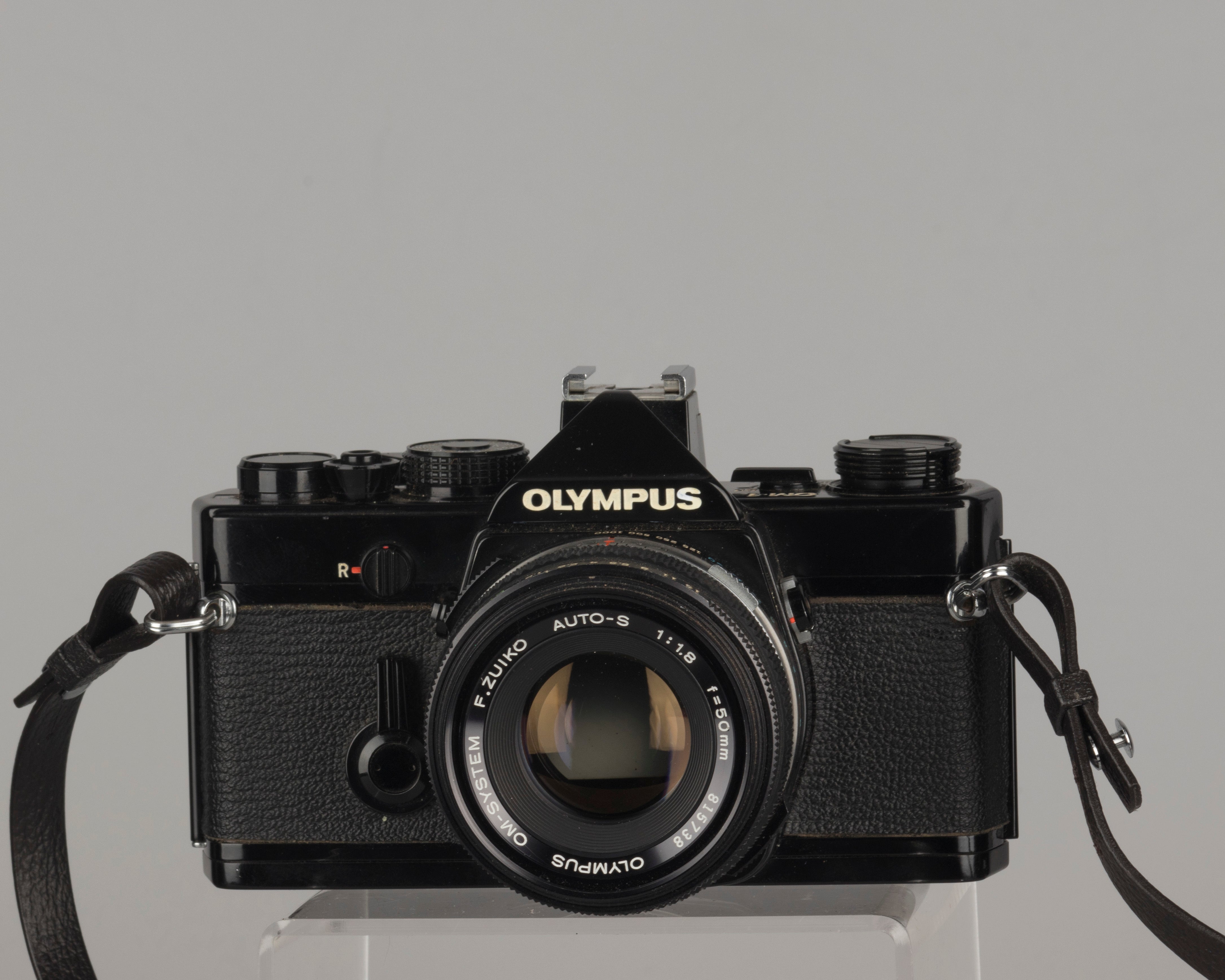 Olympus OM-1 35mm film SLR w/ Zuiko 50mm f1.8 lens and ever-ready case