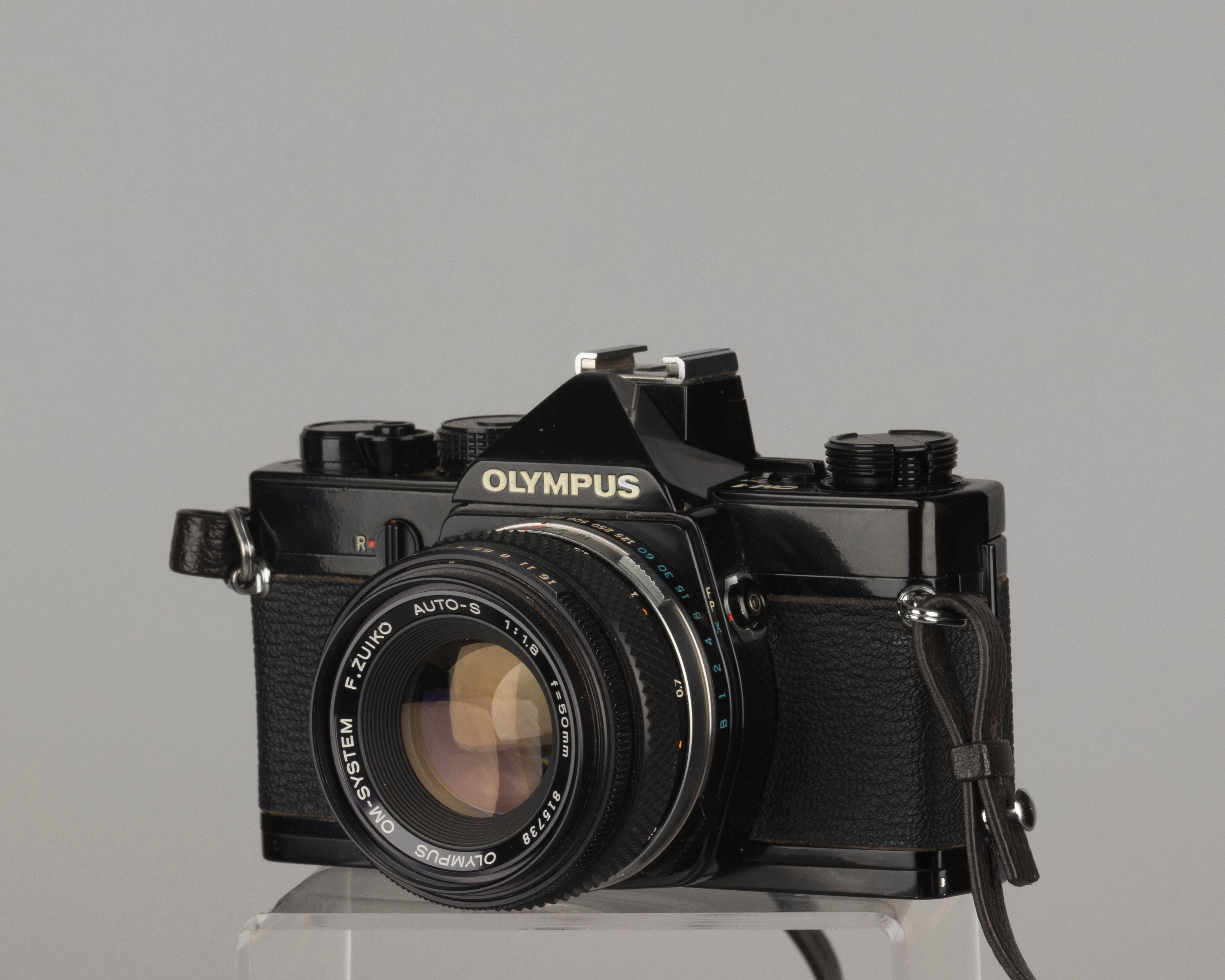 Olympus OM-1 35mm film SLR w/ Zuiko 50mm f1.8 lens and ever-ready case