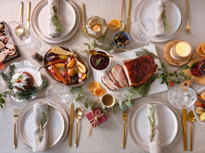 Christmas dinner with reusable partyware image from Canva