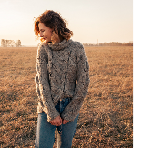 Woman in a cozy sweater - image from Canva