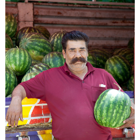 Farmer selling his watermelons - Image from Canva