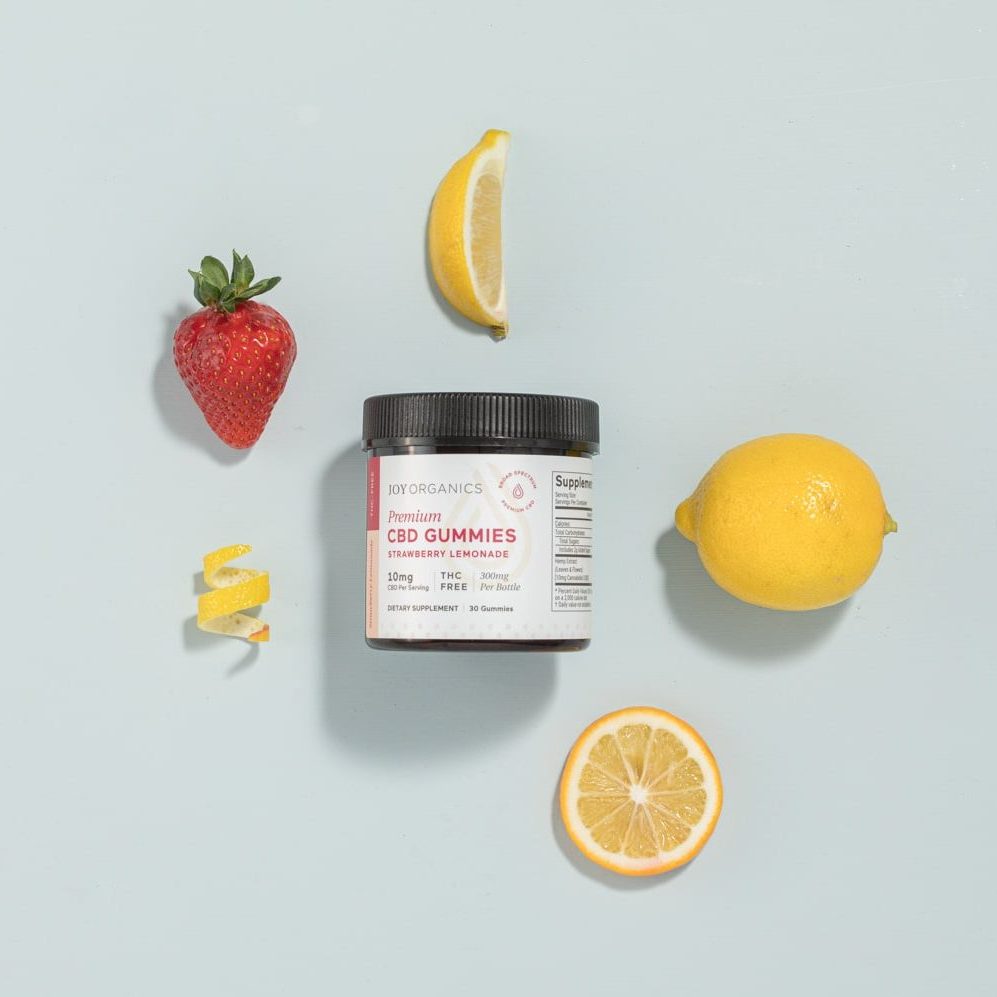 strawberry lemonade CBD gummies surrounded by fruit