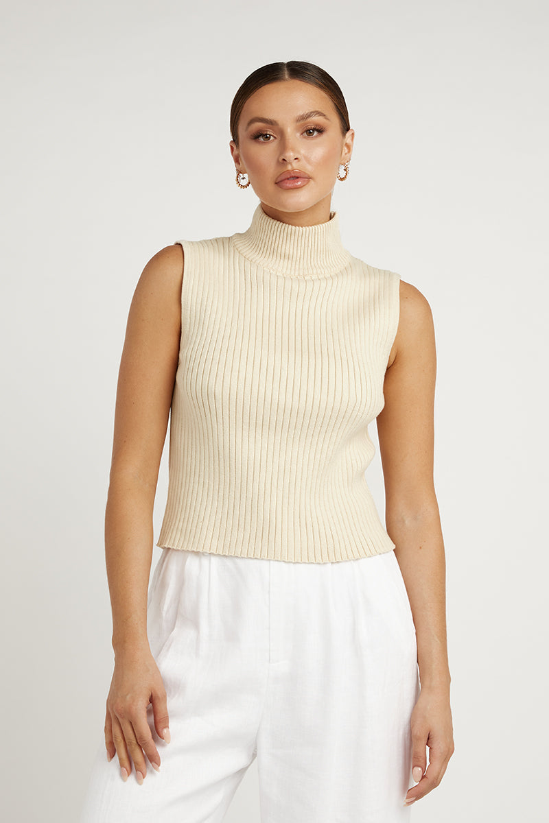 cream turtleneck sleeveless top