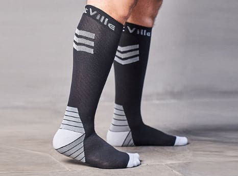 Compression socks, designed for gout patients, may feel warmer than regular socks of the same thickness due to their unique design.