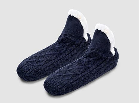 FitVille’s slip-resistant slipper socks-cozy for dog with a pair of outdoor slippers.