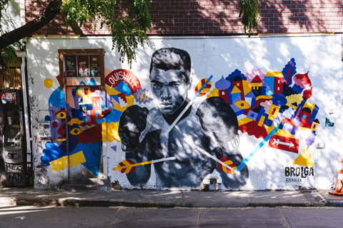 Muhammad Ali graffiti on white wall