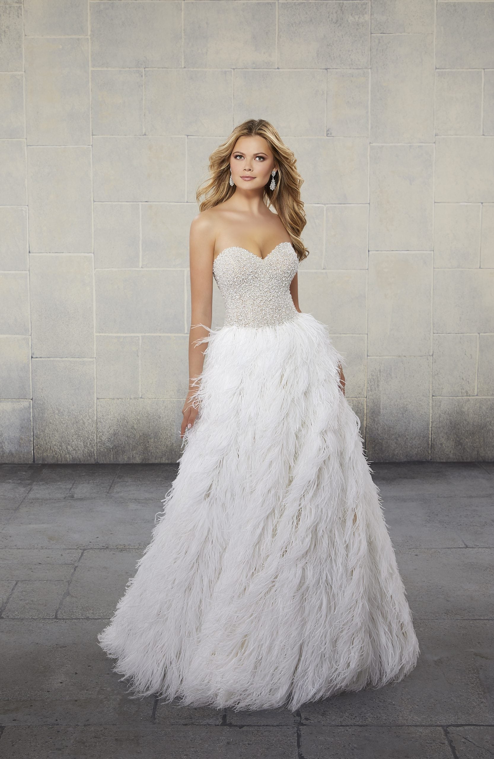 Wedding dress with feathers, winter wedding dress trends