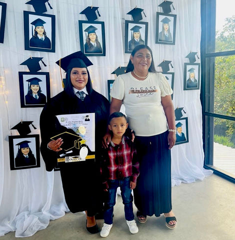 Melissa graduating from high school with her mom, Sonia and son, Douglas