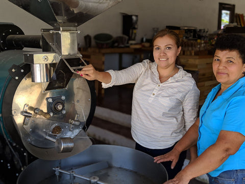 Nohelia roasting coffee in Honduras