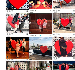 Series of thumbnails from an Instagram feed showing various people in front of a large fiberglass heart.