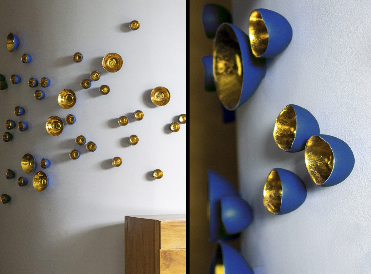 Two images side by side of blue painted Gold Wall Play. Image on the right is a close up.