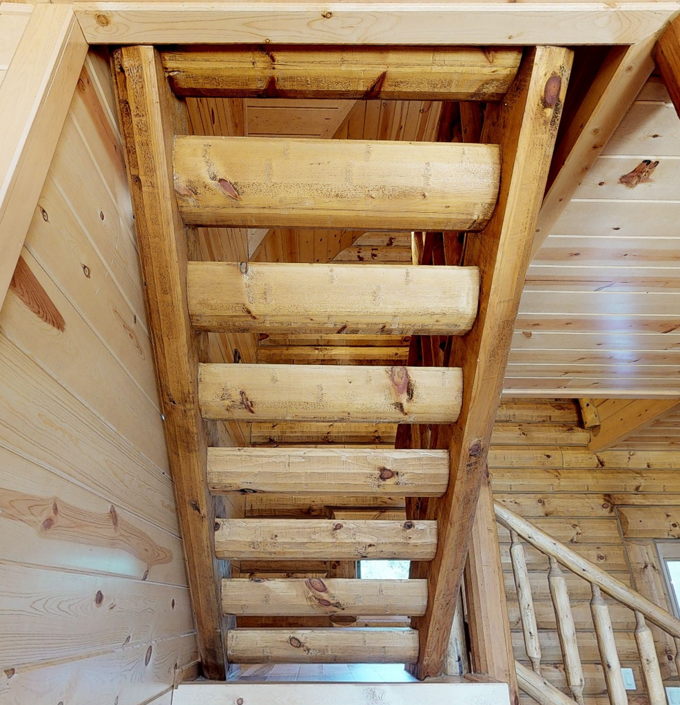 Golden Eagle Log Homes Round Half Log Stairs System