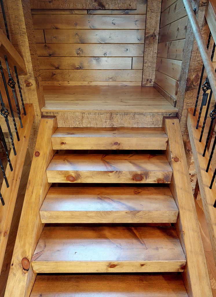 golden eagle log and timber homes log home mart parmeter square timber stairs treads stringers hand hewn smooth wisconsin rapids Golden Eagle Log & Timber Homes Stairs Steps Stairway Timber stairs square rectangular rectangle stairs stair system stairway steps rustic log home mart zach zachary parmeter  6x12 12x6 6 x 12 12 x 6 beam
