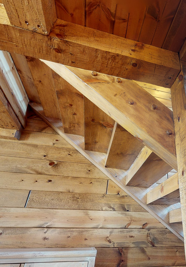 Hand-Hewn Square Timber Stair System Surface Texture