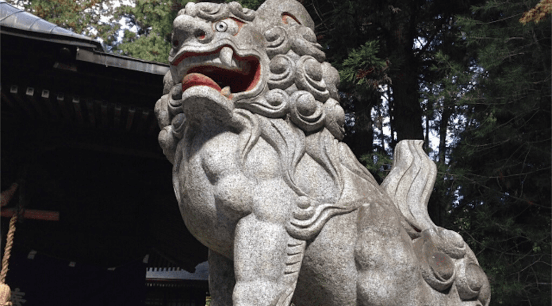 Statue lion chinois pierre