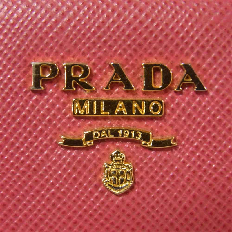 PRADA プラダ サフィアーノ リボン ラウンド ファスナー 長財布 ピンク系【中古】