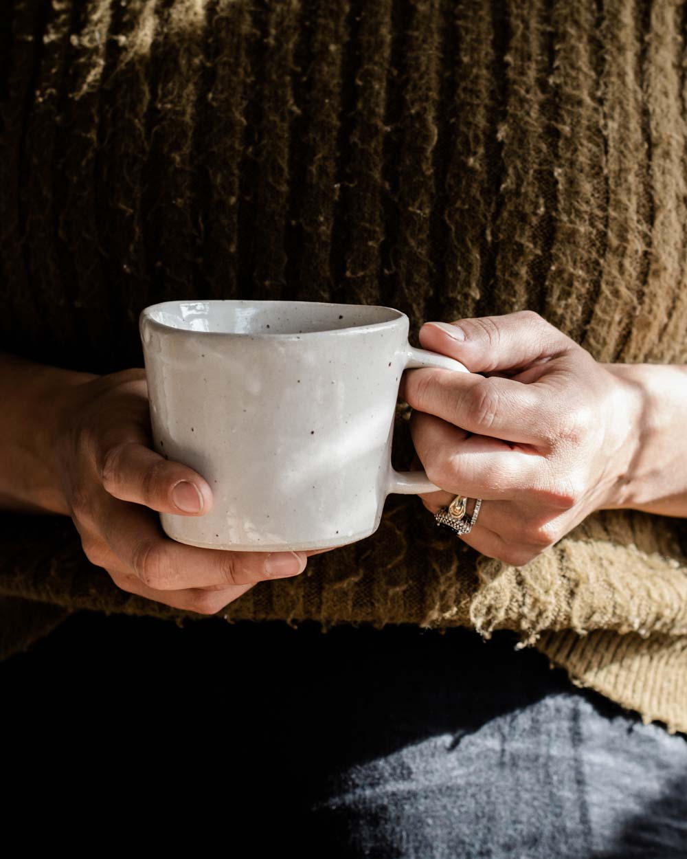 Christie from The Slow Drift, enjoying a cuppa from a handmade stoneware mug