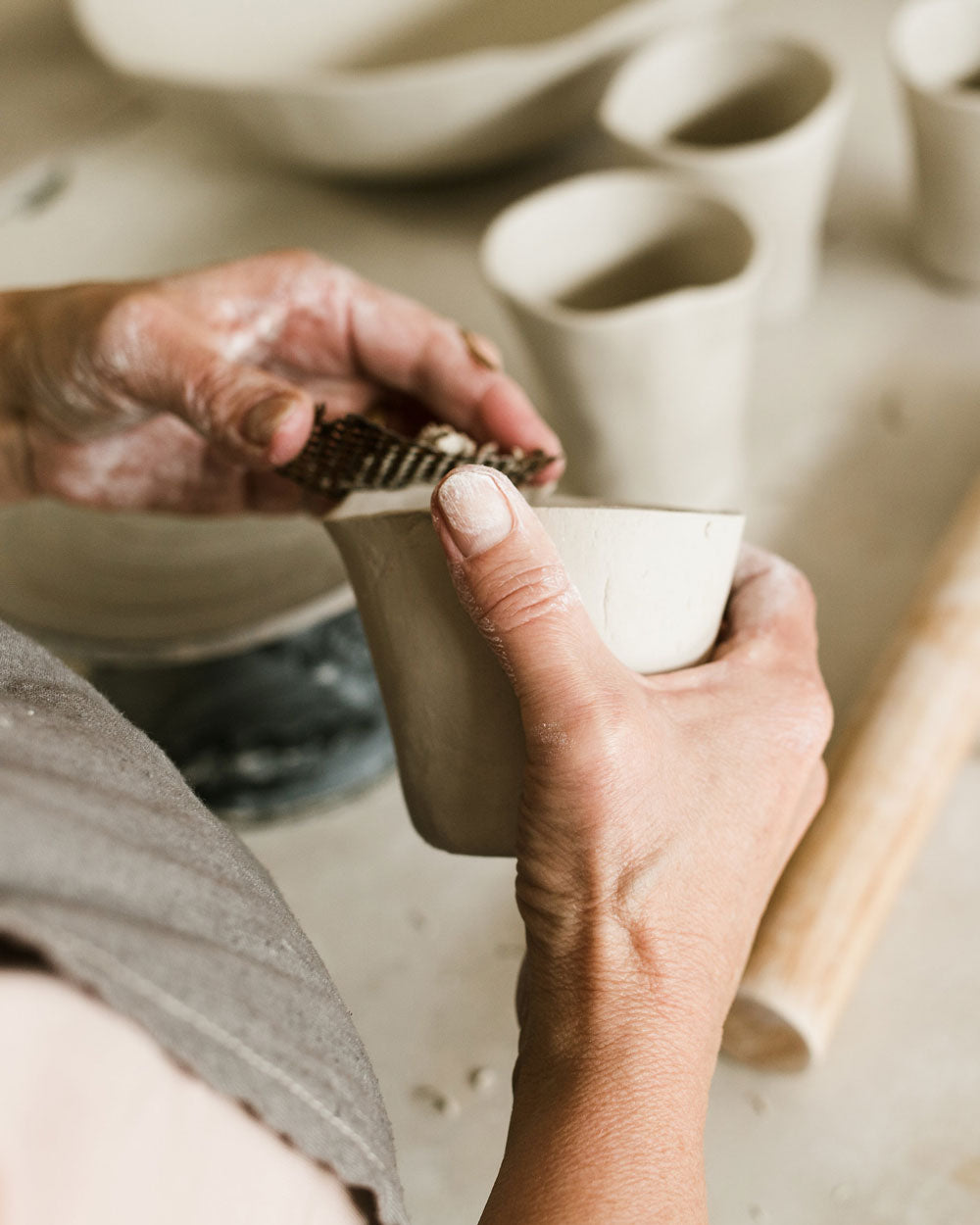 Julie making a cup