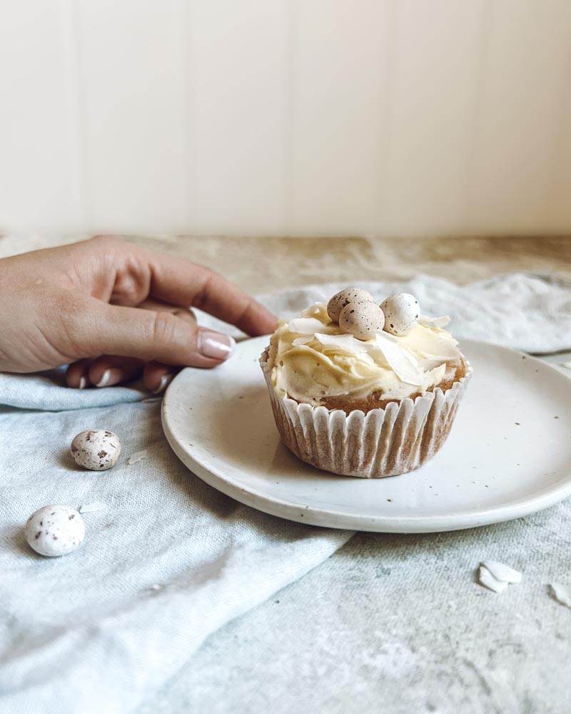 coconut cupcakes on a handmade plate