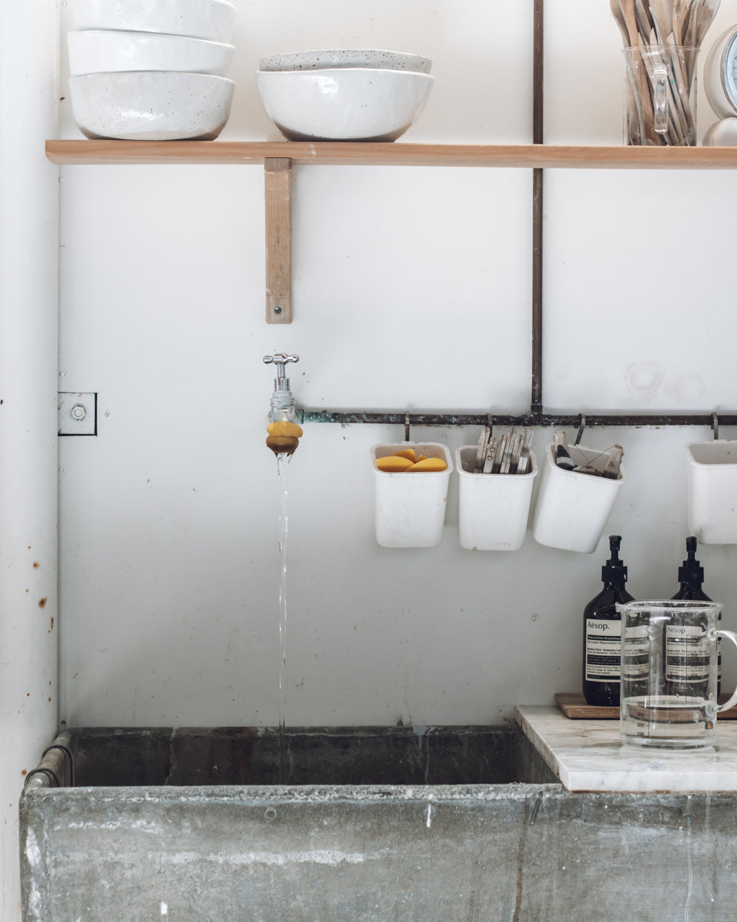 vintage concrete sink in the winterwares pottery studio