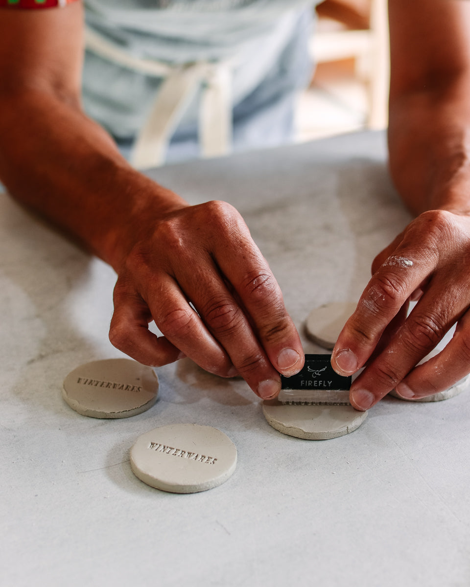 Stamping clay with Winterwares logo