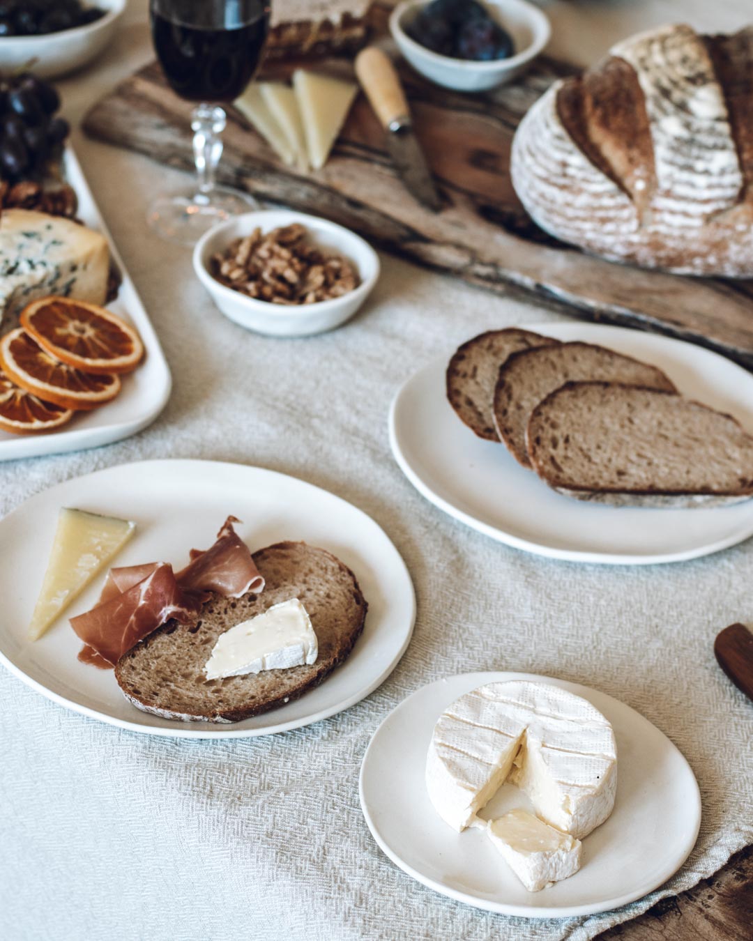 Sourdough bread and cheese on handmade ceramics, made in Western Australia