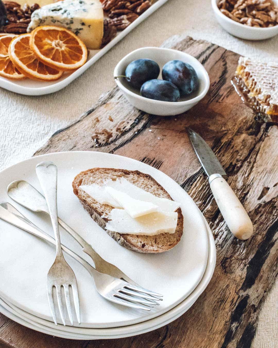 cheese on sourdough on handmade plates