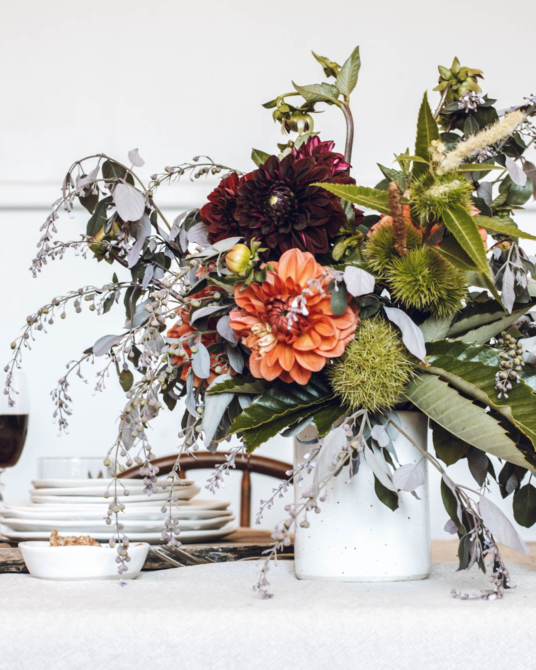 Dahlia's and other flowers in a handmade pottery vase