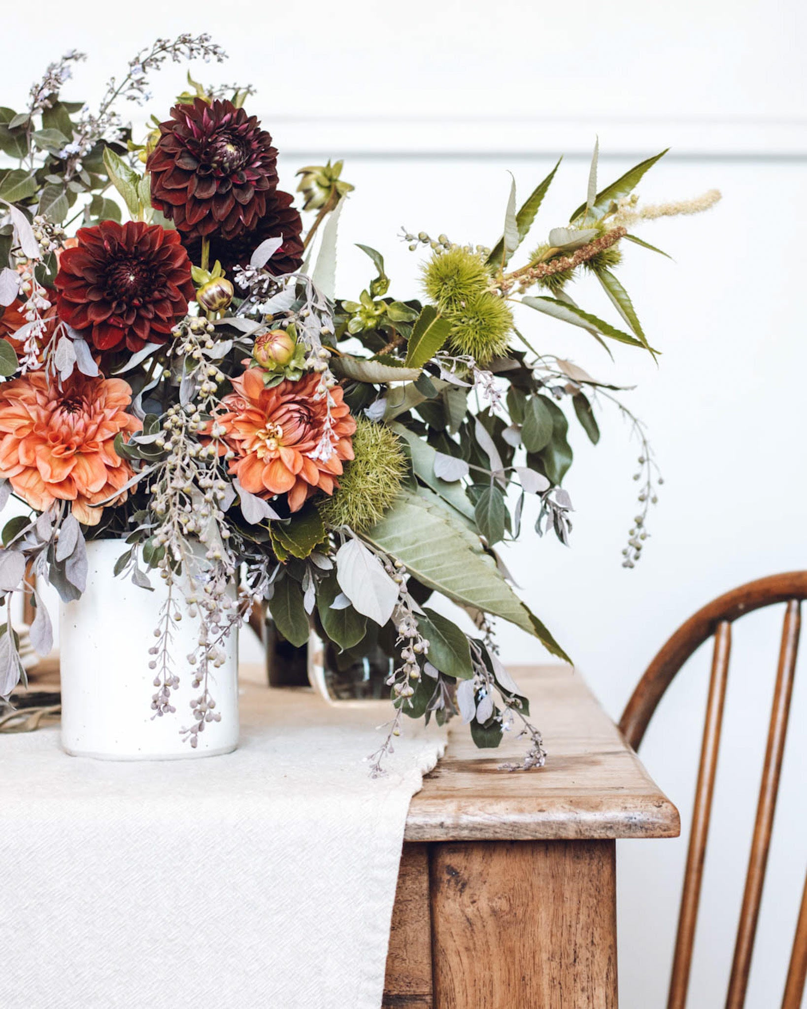 Vase filled with flowers on a table