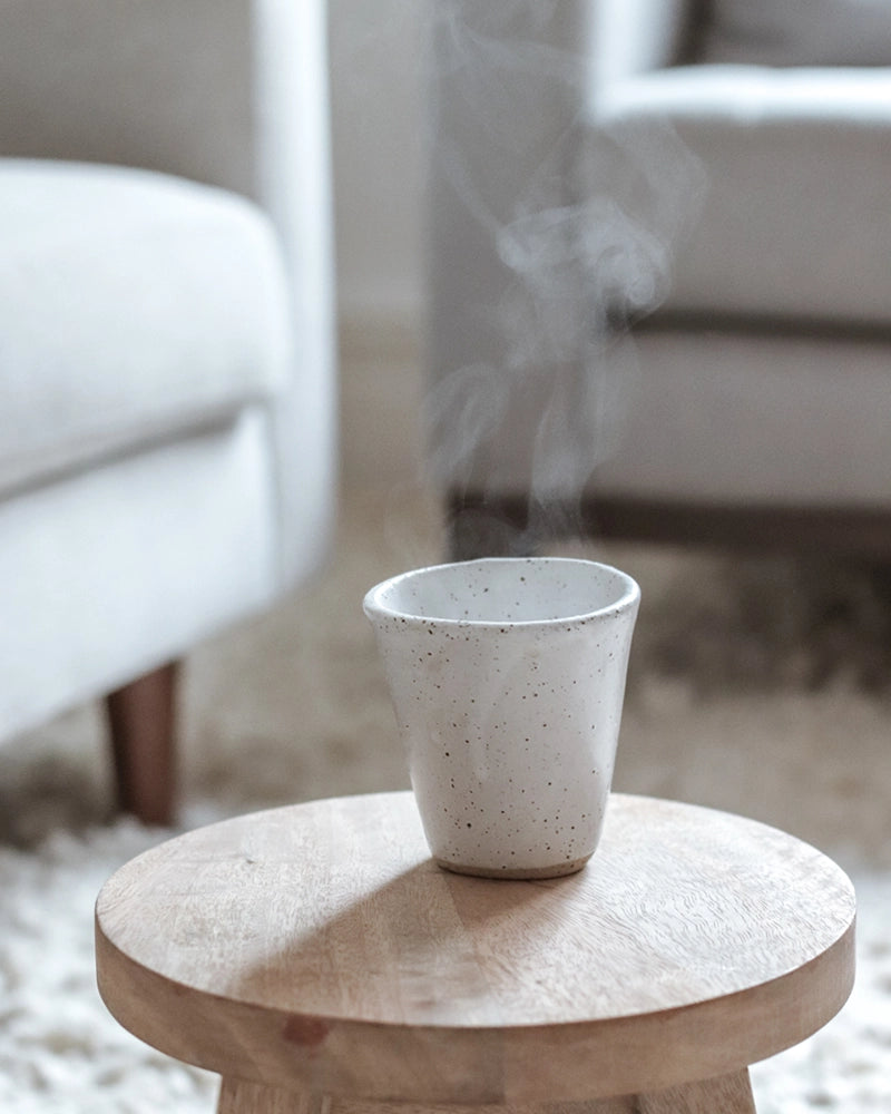 latte cup on a wooden stool