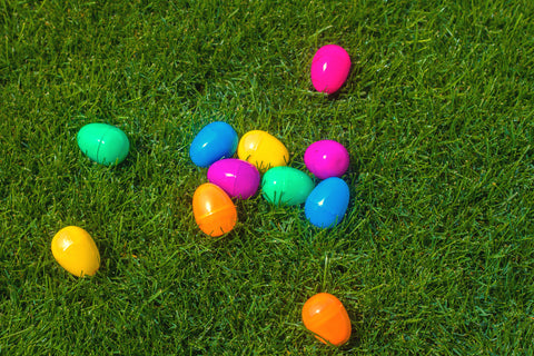 plastic easter eggs on the grass