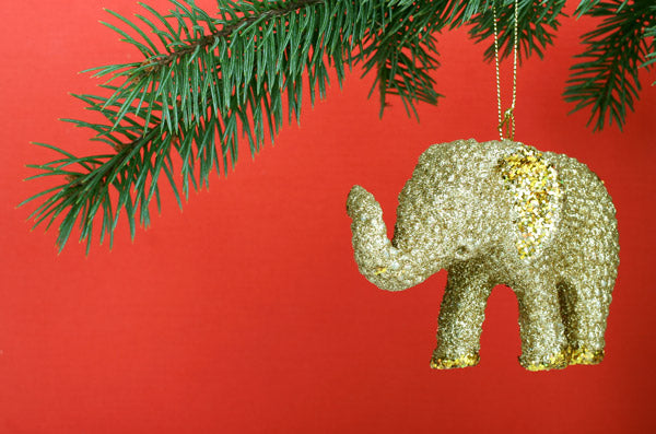 https://cdn.shopify.com/s/files/1/0265/8267/9657/files/Elephant-Christmas-ornament-on-tree_600x600.jpg?v=1698325396
