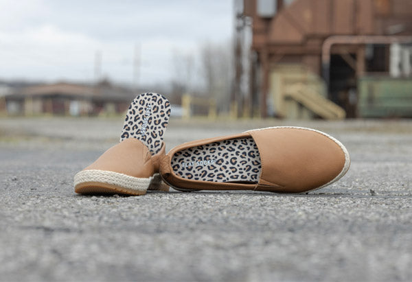 leopard print sock inserts inside tan slip on shoes