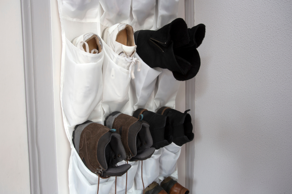 Over the door shoe organizer with shoes inside