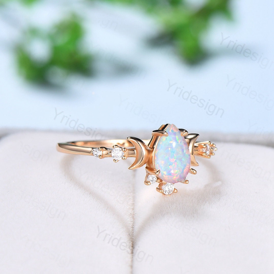 fire opal promise rings