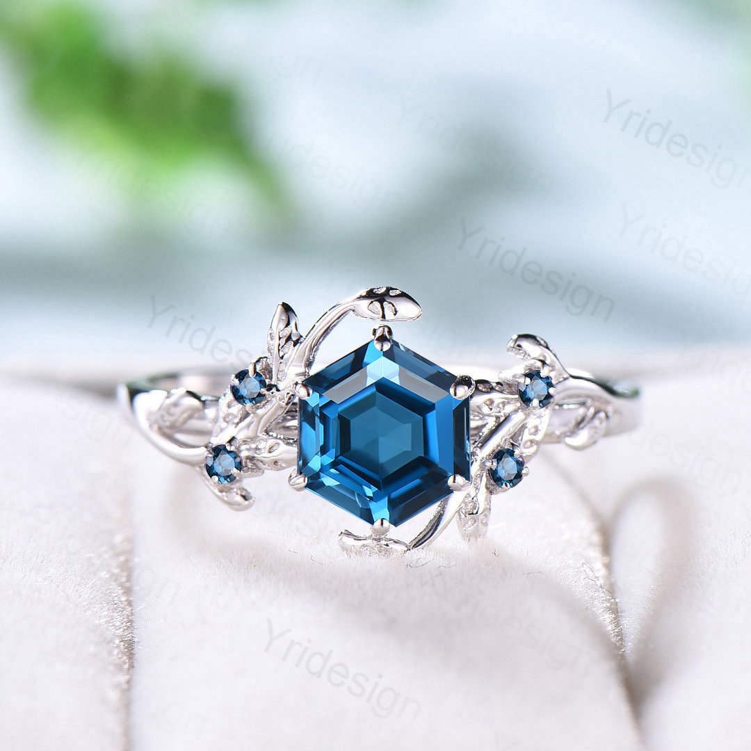 18ct White Gold Brilliant Cut Diamond And Oval Cut Blue Topaz 0.35ct And  1.50ct Ring
